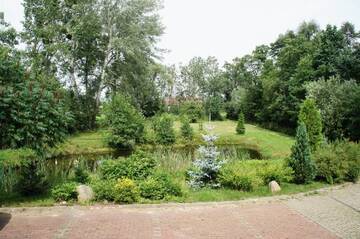 Фото номера Дом с 4 спальнями Дома для отпуска Dom Wilków г. Leoncin 70