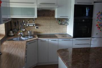 Фото номера Дом с 4 спальнями Дома для отпуска Dom Wilków г. Leoncin 50